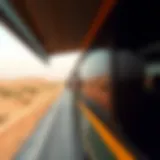 Scenic view of a bus on a desert road