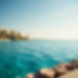 A serene view of Dolphin Bay with pristine waters reflecting the sky