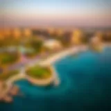 Aerial view of Al Mamzar showcasing its lush parks and beachside.