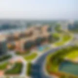 An aerial view of Al Maya showcasing its modern architecture and green spaces