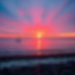 Serene view of Mangrove Beach at sunset with vibrant colors reflecting on the water