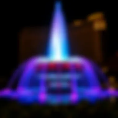 Illuminated Pointe Water Fountain at night with vibrant colors