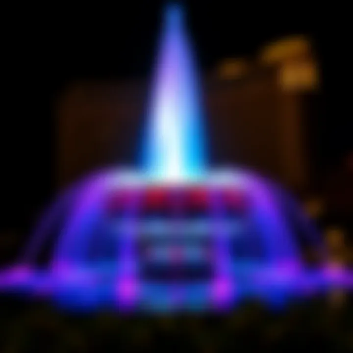 Illuminated Pointe Water Fountain at night with vibrant colors