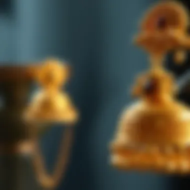 Close-up of jhumka gold jewelry emphasizing craftsmanship